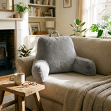 Reading Bed Pillow with Arms on sofa with cup of tea